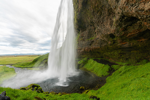 Seljalandsfoss is a waterfall in Iceland. Seljalandsfoss is located in the South Region in Iceland It is part of the Seljalands River that has its origin in the volcano glacier Eyjafjallajokull.