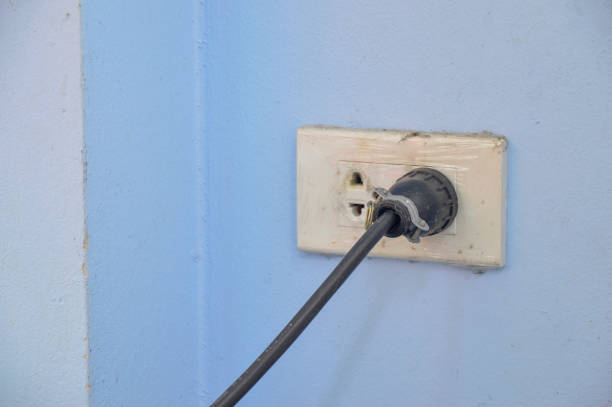 istock The power plug is plugged into the wall outlet. 1442159802