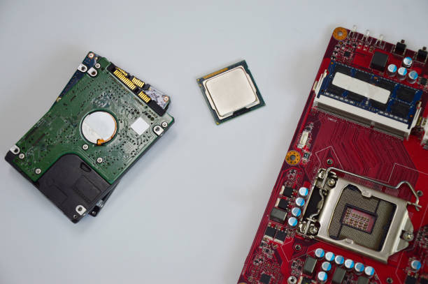 istock top view of computer equipment cpu harddisk motherboard messy place on a white background 1442159825
