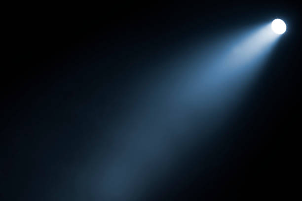 istock Close up of light beam isolated on black background 1442161327