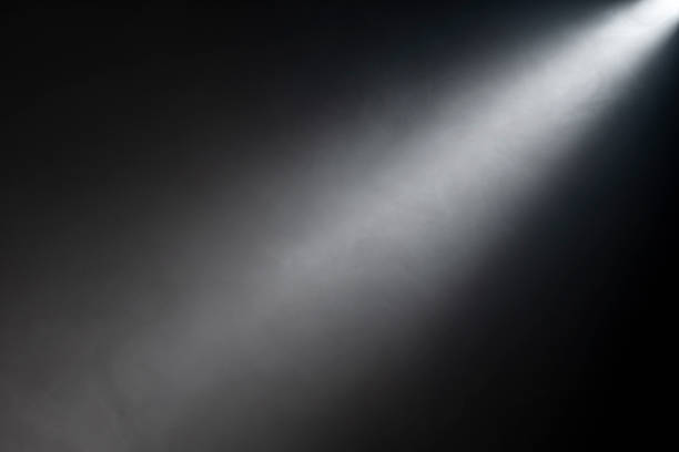 istock Close up of light beam isolated on black background 1442161376