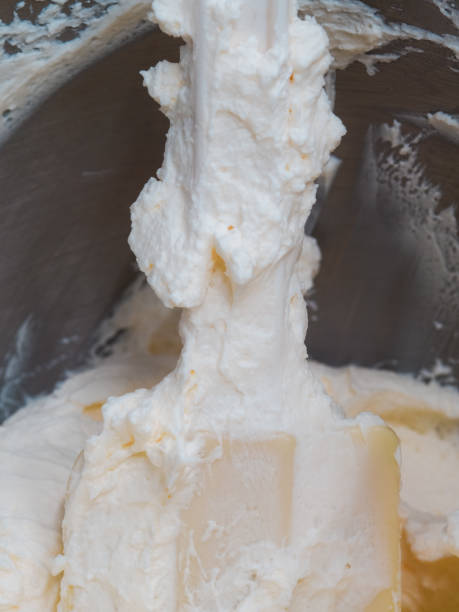 istock cheese cream on spatula mixer for cheesecake production in bakery 1442163978