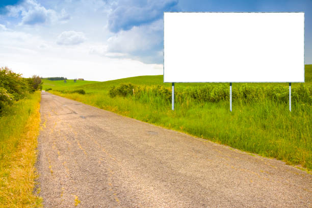 istock Blank advertising billboard immersed in a rural scene - image with copy space 1442165297
