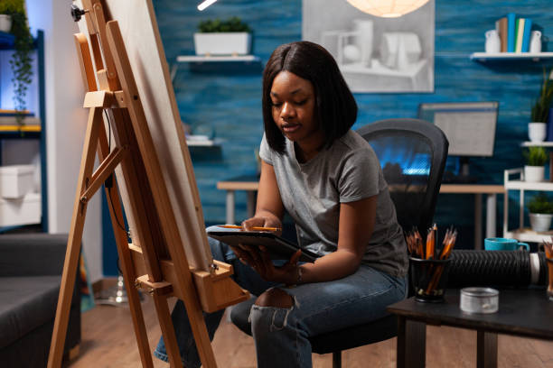istock African american student browsing draw inspiration on tablet 1442166000