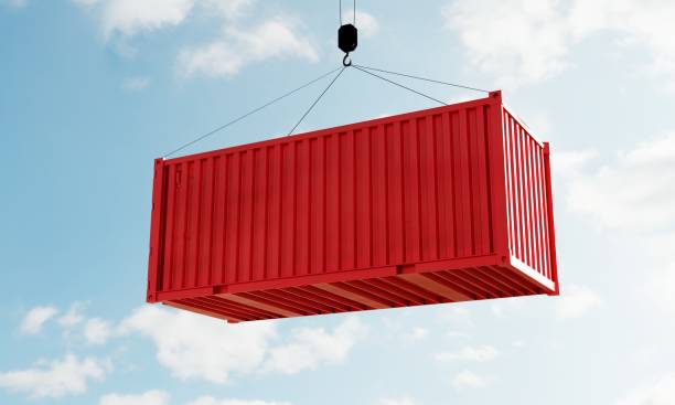 Red cargo containers with empty blank text for advertising mockup template on crane in depot warehouse with sky background. Business industrial and transportation concept. 3D illustration rendering stock photo