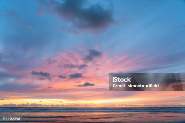Perranporth Beach At Sunset Stock Photo - Download Image Now - Beach, Beauty In Nature, Breaking Wave