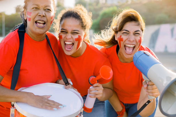 istock Excited diverse ladies shouting during soccer match on sunny day 1442168852