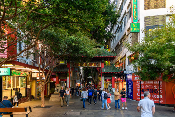 Chinatown main entrance in Sydney city Sydney, Australia - April 16, 2022: Chinatown main entrance with people walking by during evening time in Sydney City st george street stock pictures, royalty-free photos & images