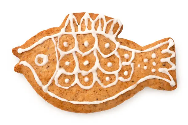 Decorated Christmas gingerbread cookie isolated on white. Top view.