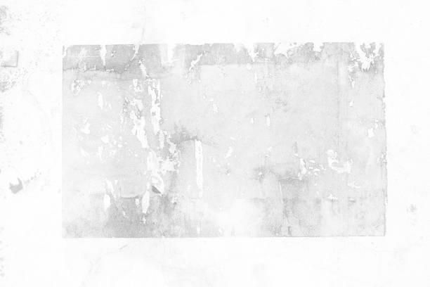 istock Peeling Poster left Glue Adhesive Stain on White Concrete wall. 1442173605