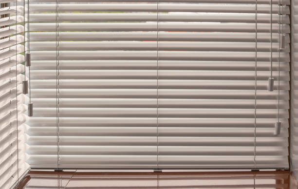 istock Venetian blinds closeup on the window. 1442173951