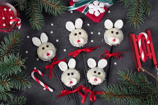 Hand made crafty Christmas tree ornaments of a cute Christmas mouse. Made from felt by hand and sewn together.