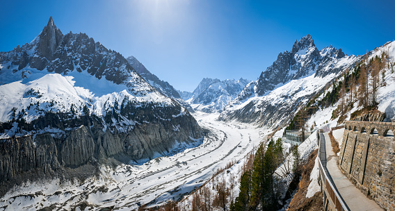 Mer de Glace glacier with view of Les Drus peak, Grandes Jorasses and Grands Charmoz Needle. Vallee Blanche of the Mont Blanc massif, Alps, Haute-Savoie (74), France