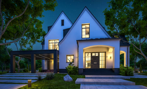 istock 3d rendering of white and black modern Tudor house in night 1442188183