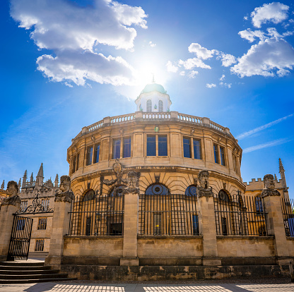 Handheld panoramic shot of the Radcliffe Camera and surrounding University buildings in Oxford.