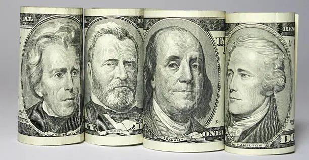 Photo of Four portraits on banknote