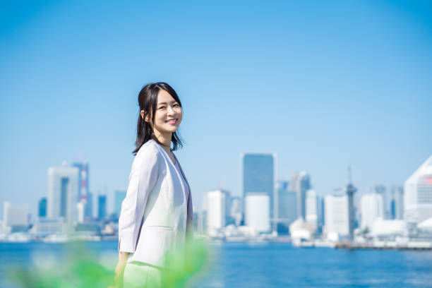 istock Businesswoman walking outside with a smile 1442190268