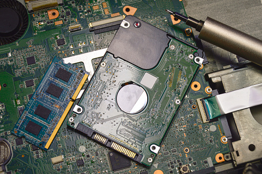 Image of hard disk, RAM, and motherboard viewed from above.