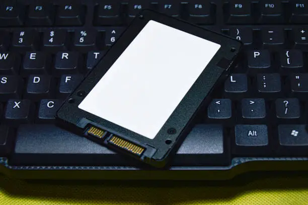 Photo of 2.5-inch SSD hard drive placed on the keyboard
