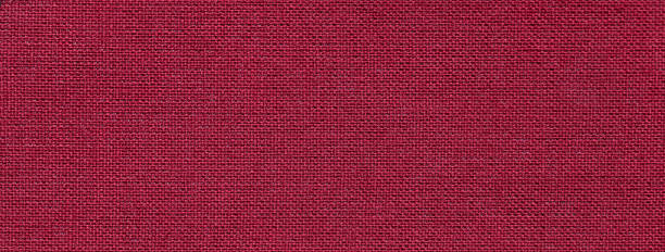istock Texture of dark red color background from textile material with wicker pattern. Vintage wine fabric 1442194944