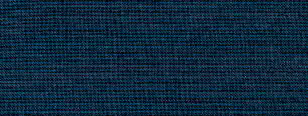 istock Texture of navy blue color background from textile material with wicker pattern. Structure of vintage fabric 1442195745