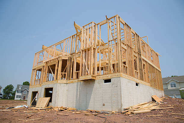 istock New Single Family House under Construction in Framing Stage 144219695