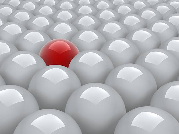 istock red ball in white ones 144219753