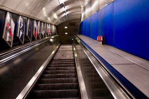 A photo of escalators in an underground station in London uk