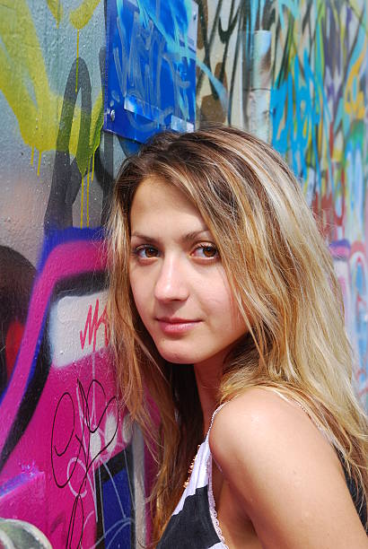 istock Blonde women with graphitic wall 144220225