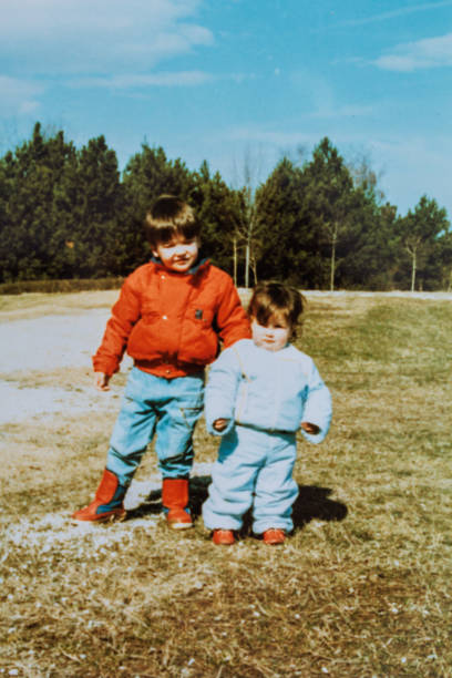 istock Children walking in public park at eighties 1442205176