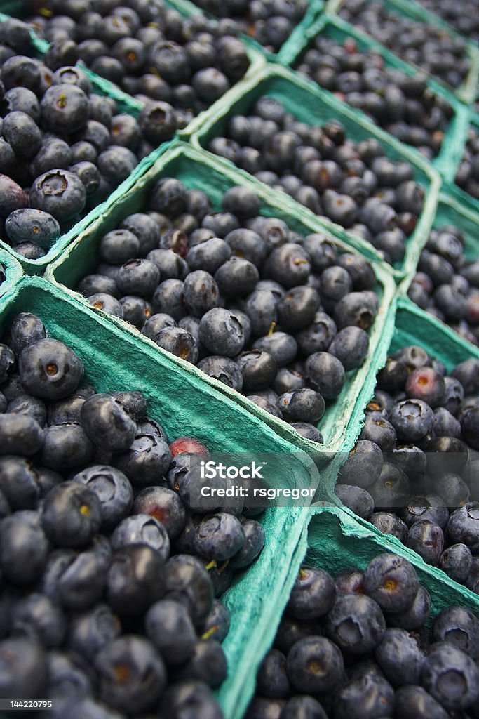 Fresh Blueberries Rows and rows of boxes of fresh blueberries in an open-air market. Antioxidant Stock Photo