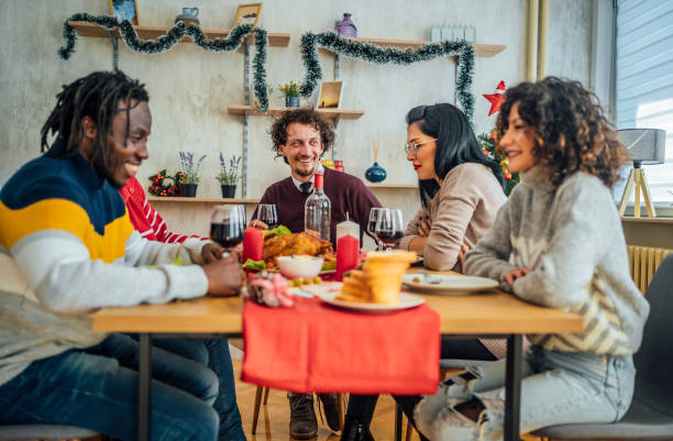 istock Friends having Christmas lunch 1442209294
