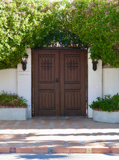 istock Rustic wood double doors at the garden entrance 1442219182