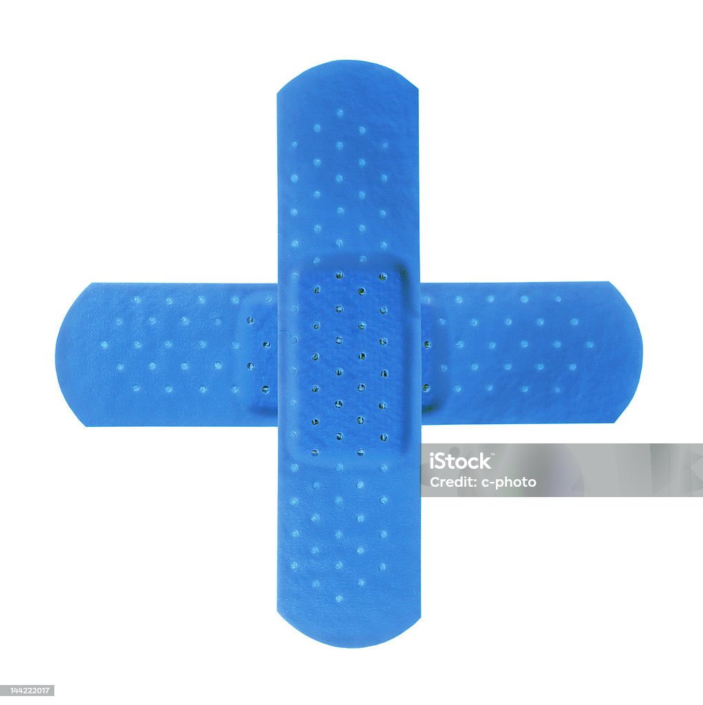 Due bendaggi effettuare blue cross - Foto stock royalty-free di Cerotto