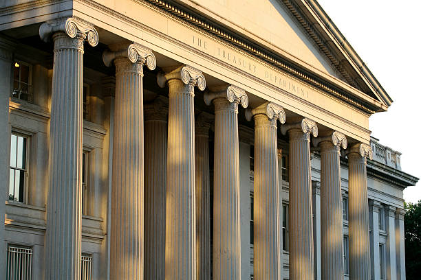 The United States Department of Treasury  Sunset at the Treasury Department treasury stock pictures, royalty-free photos & images