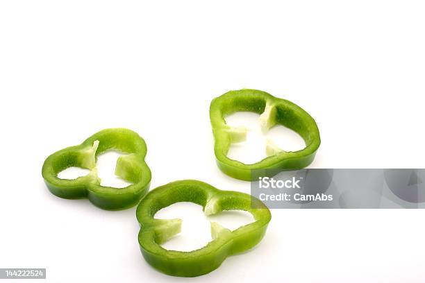 Bell Green Pepper Slices On White Background Stock Photo - Download Image Now - Appetizer, Baking, Close-up