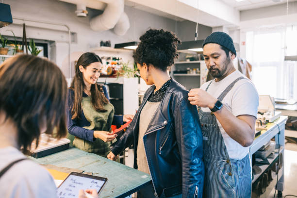 istock Multi-ethnic group of clothing designers working in the studio 1442225463