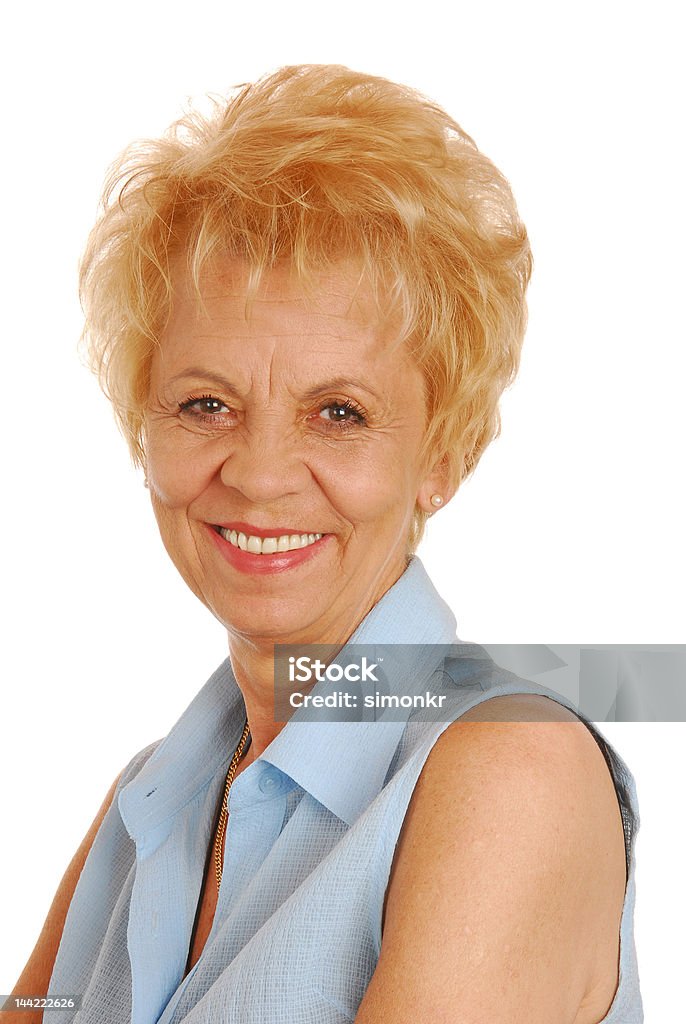 Nonna con incantevole sorriso sul suo volto - Foto stock royalty-free di 60-69 anni