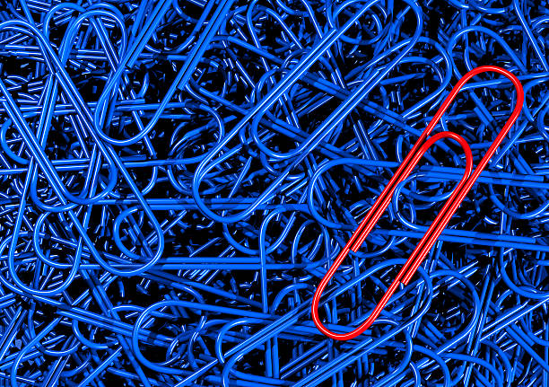 Azul Paperclips con un sujetapapeles rojo - foto de stock