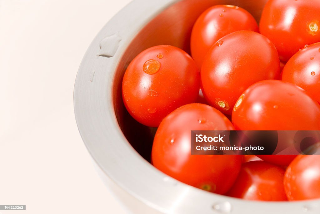 Orange Tomatoes in a bowl Orange Tomatoes in a bowl. Biology Stock Photo