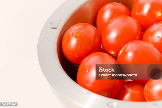 Orange Tomatoes In A Bowl Stock Photo - Download Image Now - Biology, Bowl, Day