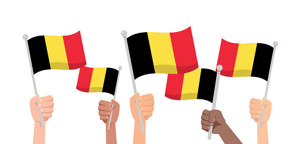 Hands with belgium flag isolated on white background. People hold belgium flag.Vector stock