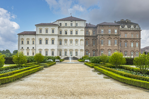 Venaria, Italy - 05-06-2022:The beautiful facade and gardens of the Reggia dei Savoia in the Venaria Reale