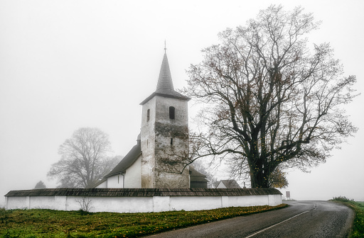 Old gothic church in Ludrova village near Ruzomberok, SlovakiaOld gothic church in Ludrova village near Ruzomberok, Slovakia. Black and white photo