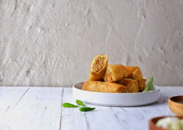 Traditional Spring rolls food containing eggs, and chicken or shrimp.
