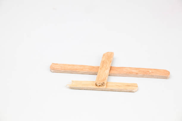 istock Ice cream sticks arranged into an airplane on a white background. 1442246541