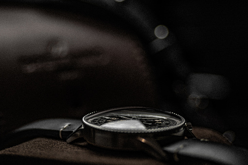 old classic vintage pilot watch on black leather bracelet with grain, navitimer