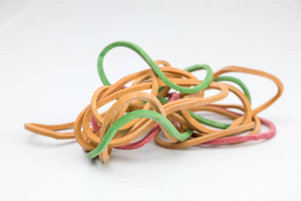 istock A group of rubber bands arranged randomly on a white background. 1442247858