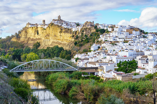 Panoramic of Arcos de la Frontera, white town built on a rock along Guadalete river, in the province of Cadiz, Spain.