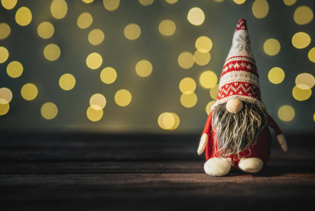 istock New Year's gnom with a gift 1442249553
